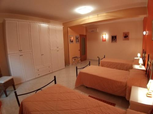 Ένα ή περισσότερα κρεβάτια σε δωμάτιο στο Mastro Toto' - Rooms & Apartment