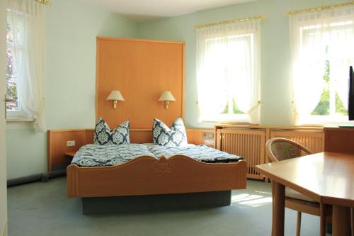 Posteľ alebo postele v izbe v ubytovaní Pension Stegmann