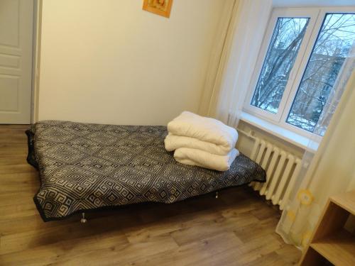 เตียงในห้องที่ Apartment Arena Riga quiet center FREE PARKING