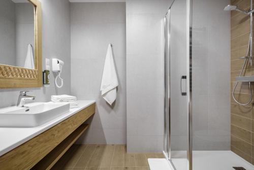 Ett badrum på Hotel Foluszowy Potok