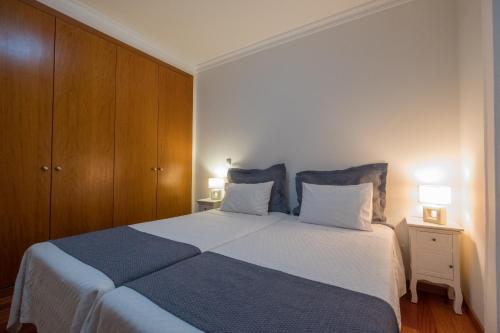 Ένα ή περισσότερα κρεβάτια σε δωμάτιο στο Apartments Madeira