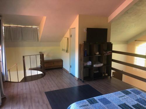 Postel nebo postele na pokoji v ubytování Lindo Chalé em Campinho Domingos Martins
