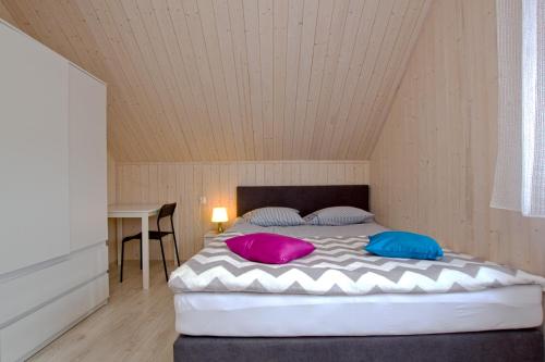 A bed or beds in a room at Marina Nadole