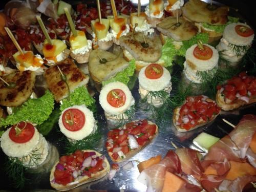 a tray of food with sandwiches and other foods at Neumanns Waldschänke in Soltau