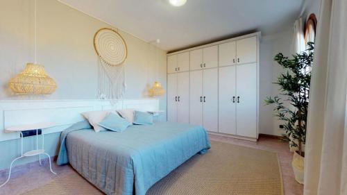 Кровать или кровати в номере Mas Boronat Resort