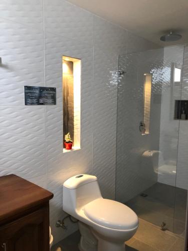 Koupelna v ubytování 40 Amigos Hotel