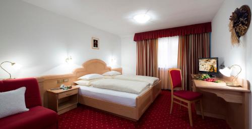 Ein Bett oder Betten in einem Zimmer der Unterkunft B&B Residence Adria