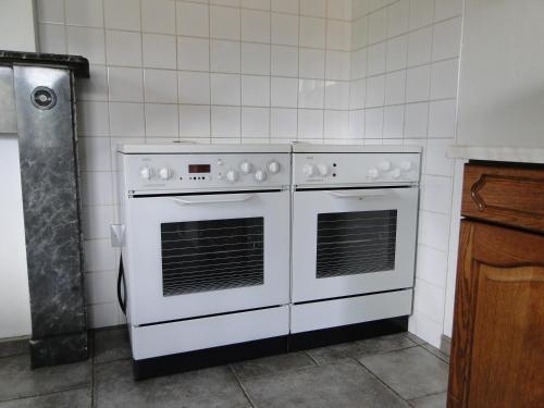 Una cocina o zona de cocina en Chambres d'hôtes des Ardennes