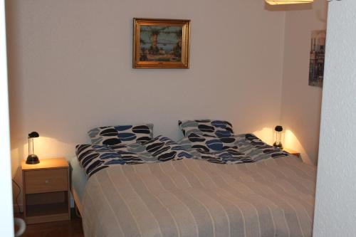 Ένα ή περισσότερα κρεβάτια σε δωμάτιο στο Lejligheder på Heygsmannavegur 15