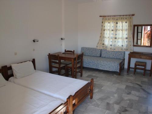 Ένα ή περισσότερα κρεβάτια σε δωμάτιο στο Calamon Apartments