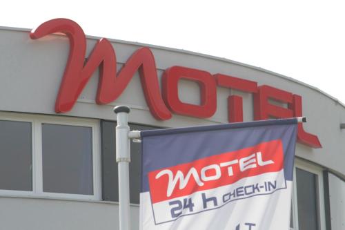 a mordstrom store with a sign in front of it at MOTEL ARBOTEL 24h self check-in in Friesach