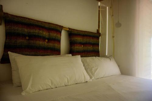 Hotel Descalzo SPAにあるベッド