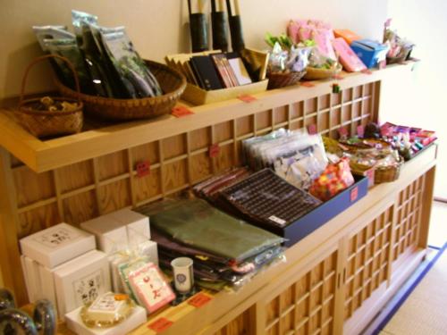 a shelf filled with lots of items in a store at Ryokan Shinsen in Takachiho