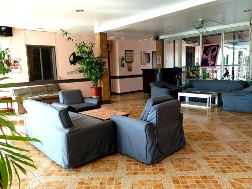 Posezení v ubytování Sola Eleganza Apartelle