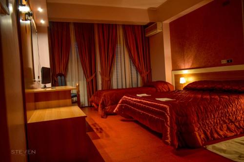 Un pat sau paturi într-o cameră la Hotel Ristorante Mommo