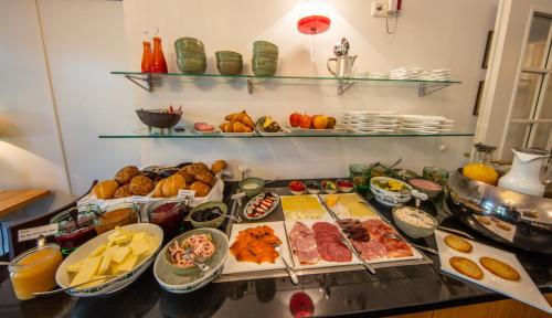 a buffet with many different types of food on a table at Villa Beilstein in Beilstein