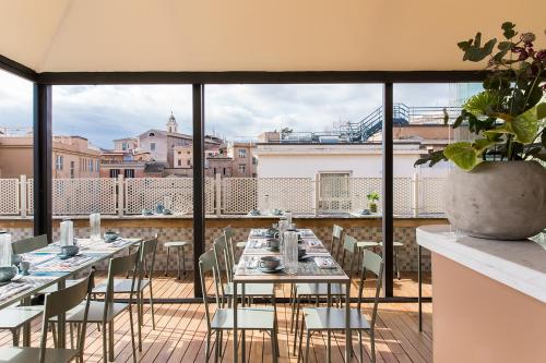 A balcony or terrace at Condominio Monti Boutique Hotel