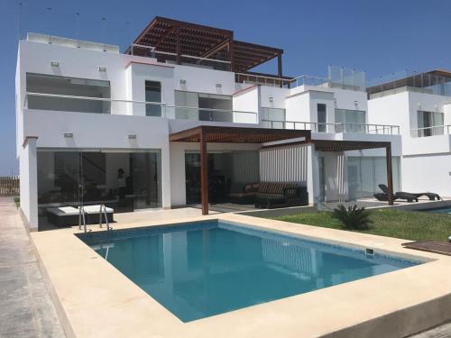 Πισίνα στο ή κοντά στο Casa 33 Sotavento Paracas