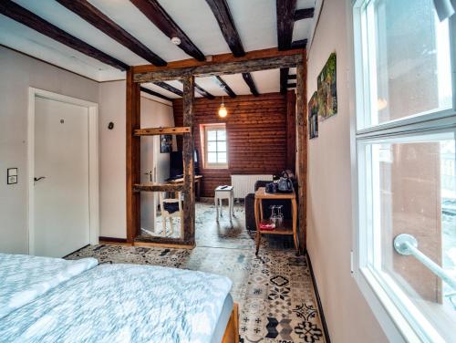 a bedroom with a bed and a window at Haus Stehlings in Monschau