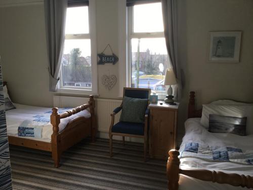 A bed or beds in a room at Lee-Side B&B 