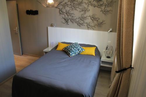 Katil atau katil-katil dalam bilik di Gite de Maillemont