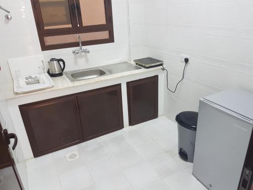 Kuchyň nebo kuchyňský kout v ubytování Sea Hotel Apartment
