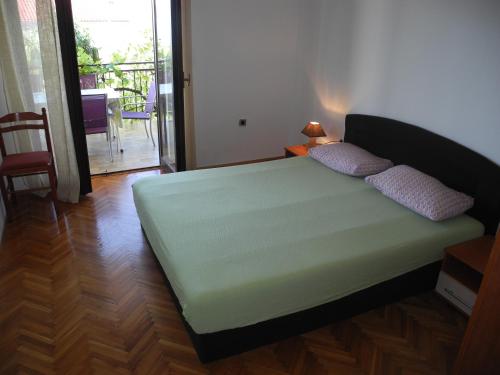 Postel nebo postele na pokoji v ubytování Apartment VUCKO 6 pax