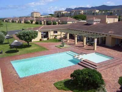 an overhead view of a house with a swimming pool at 142 hermanus beach club in Hermanus