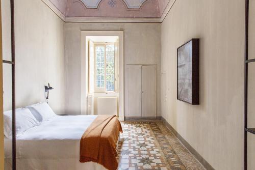 Palazzo Daniele, a Member of Design Hotelsにあるベッド