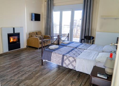 Кровать или кровати в номере Nomads Meteora