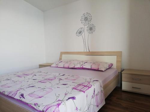 Ένα ή περισσότερα κρεβάτια σε δωμάτιο στο Apartment BlueBay