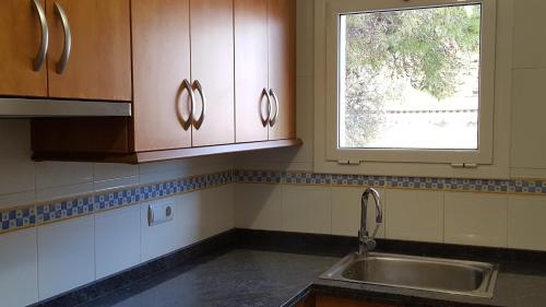 Kuchyň nebo kuchyňský kout v ubytování Salou apartamento cerca de playa y zona turística