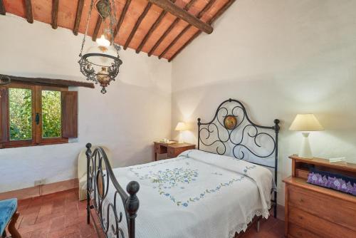 Ένα ή περισσότερα κρεβάτια σε δωμάτιο στο Casale Sandonatino by VacaVilla