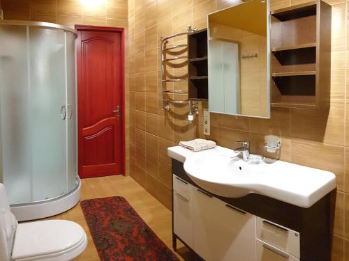 Ванна кімната в Zeliūga Apartments