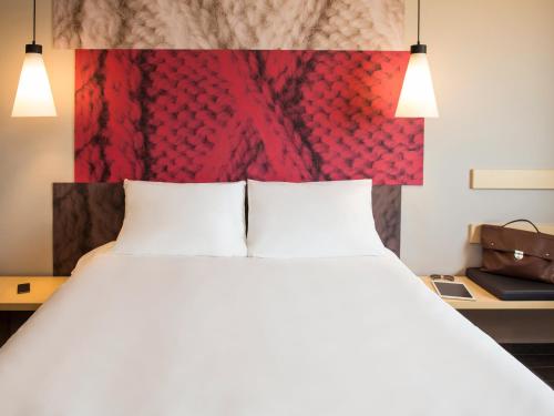 Ein Bett oder Betten in einem Zimmer der Unterkunft Ibis Torreon