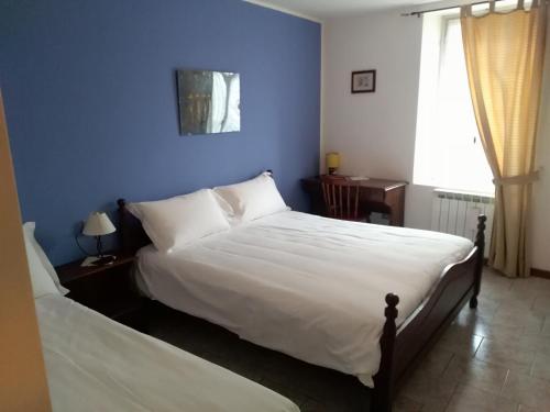 Postel nebo postele na pokoji v ubytování albergo ristorante coppa