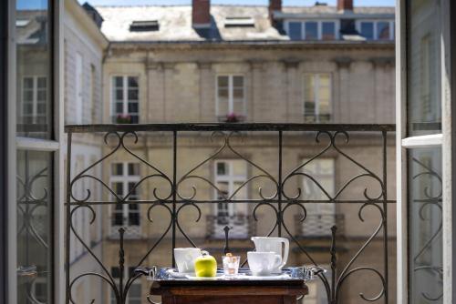 Un balcón o terraza de Hotel Voltaire Opera Nantes Centre