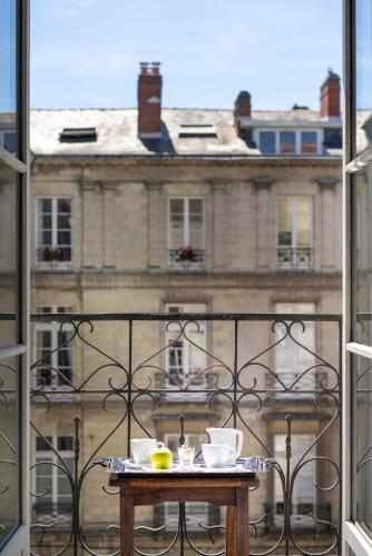 Un balcón o terraza de Hotel Voltaire Opera Nantes Centre