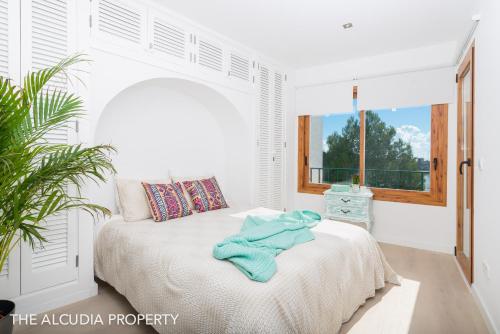 En eller flere senge i et værelse på Apartamento Marina