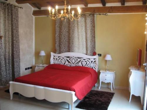 Een bed of bedden in een kamer bij Al Parco