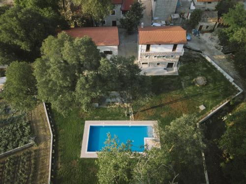 an overhead view of a yard with a swimming pool at Stara kuća Estate in Ljubuški