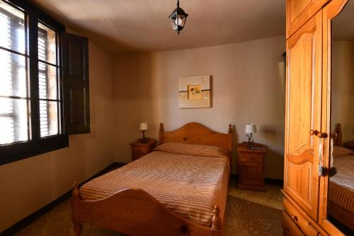 Ein Bett oder Betten in einem Zimmer der Unterkunft EVA & TRAVEL - El Cor del Montsant