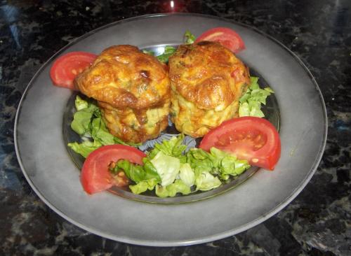 a plate of food with tomatoes and salad on it at Le Jardin Des Epices in Taroudant