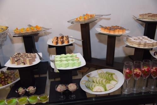 a buffet with many different types of food on plates at Serendib Signature Resort in Digana