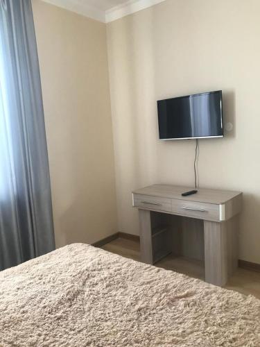 Телевизор и/или развлекательный центр в Sad Dolgoletiya Hotel