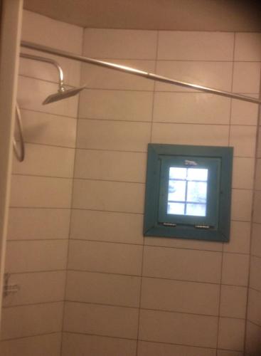 a window in a bathroom with a shower at Kritikies Elyros in Pitsidia