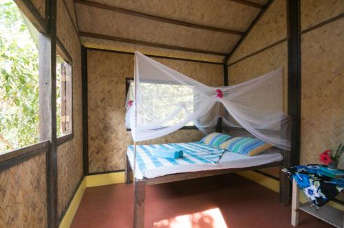 Postel nebo postele na pokoji v ubytování Busuanga Backpackers