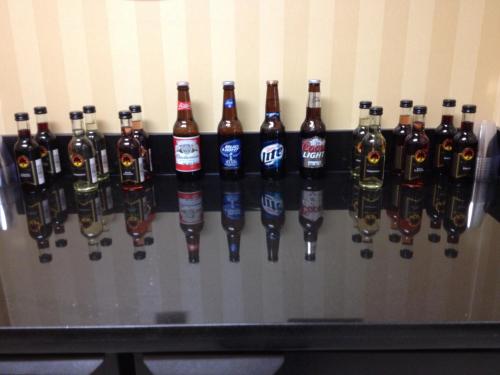 a bunch of bottles of beer on a wall at Cobblestone Inn & Suites - Langdon in Langdon