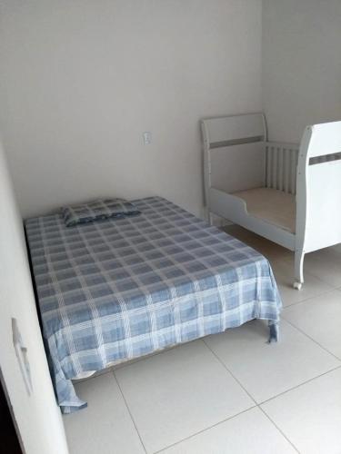 Ένα ή περισσότερα κρεβάτια σε δωμάτιο στο Chalé, refúgio Ananda, Ubatuba