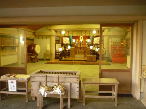 a room filled with furniture and a room with a room at Futami Terrace B in Ise